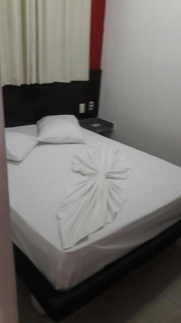 Hotel Like I Contagem Bagian luar foto